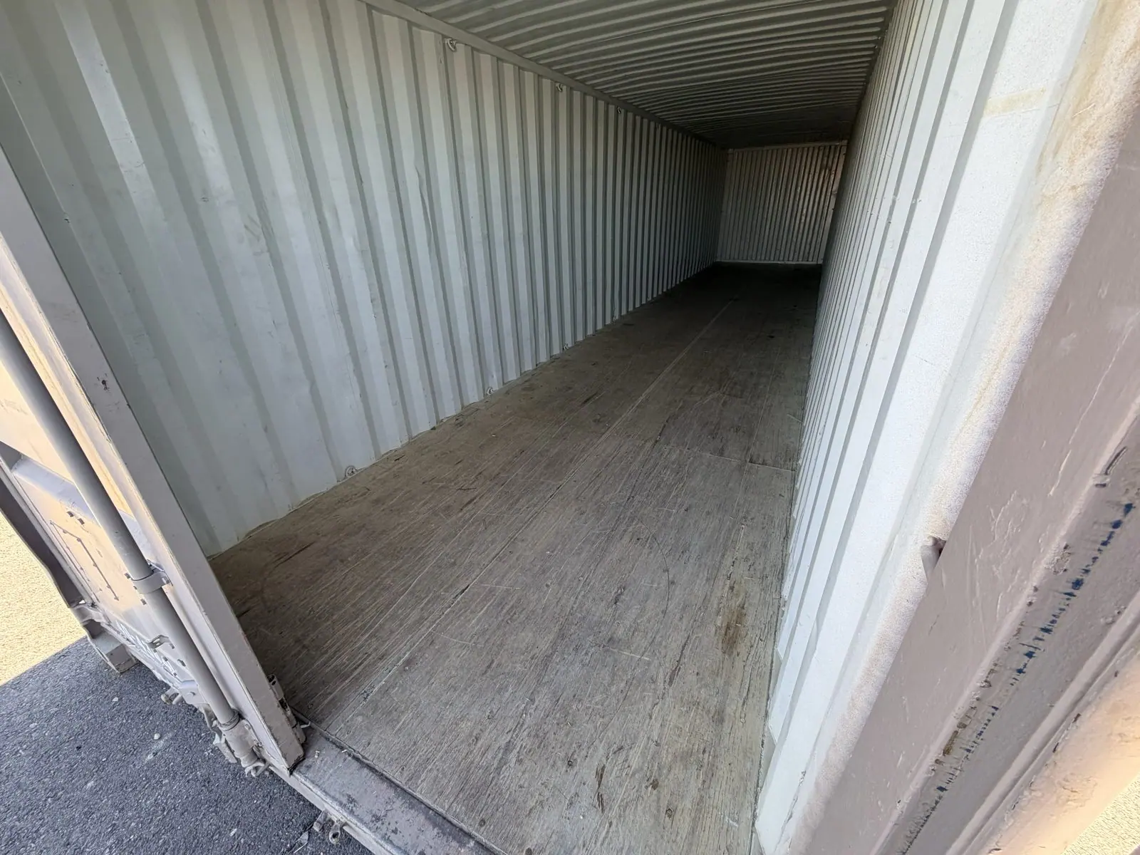Same shipping container emptied and swept after commercial junk removal by Henderson Junk Solutions