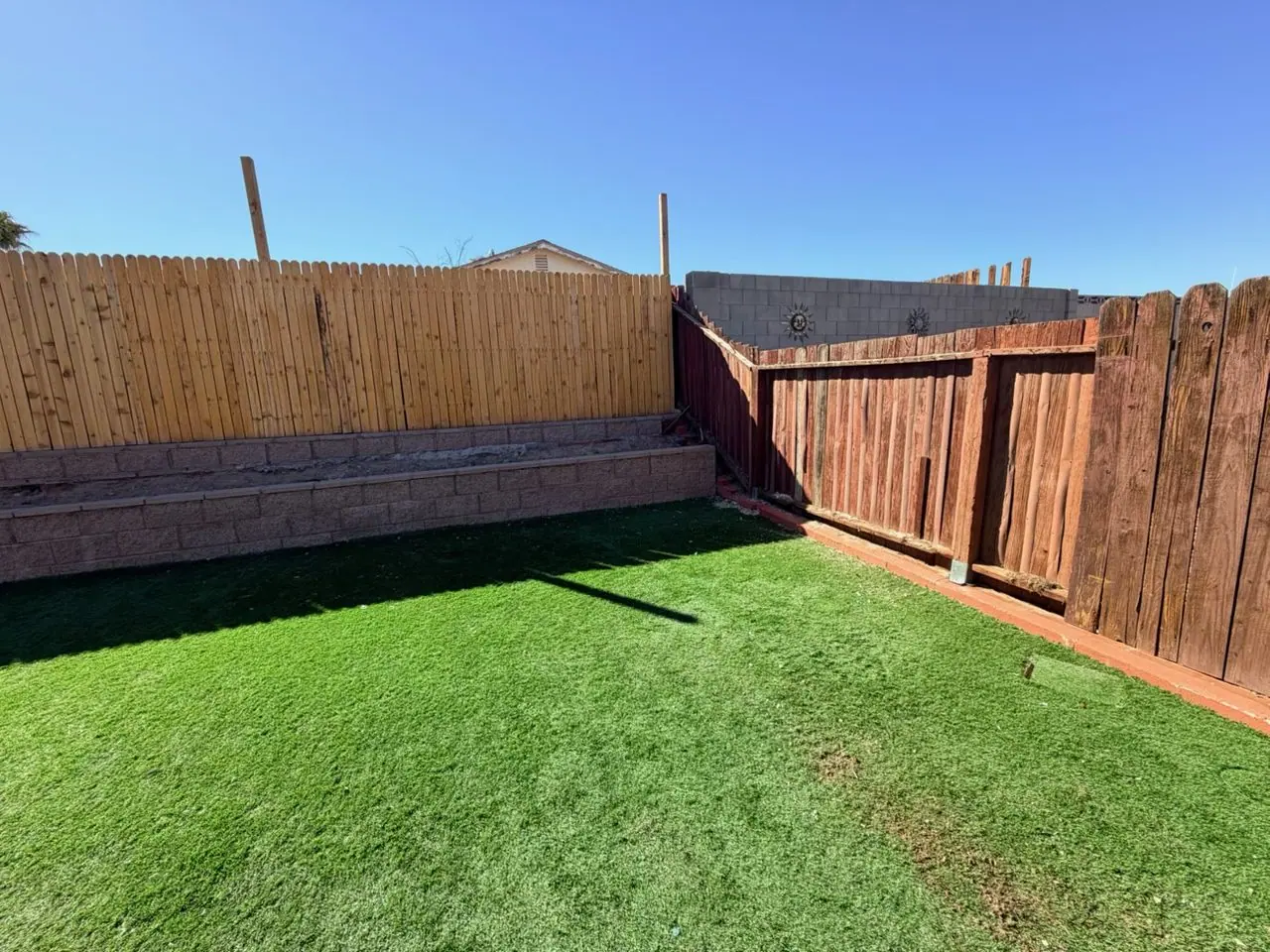 Same Downtown Henderson back yard with the old pool hauled away and the turf clear after residential junk removal by Henderson Junk Solutions