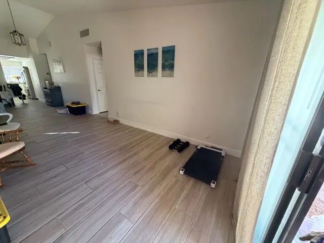 Same Green Valley living room cleared and ready for new furniture